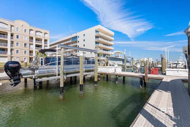 dock area featuring a water view and boat lift