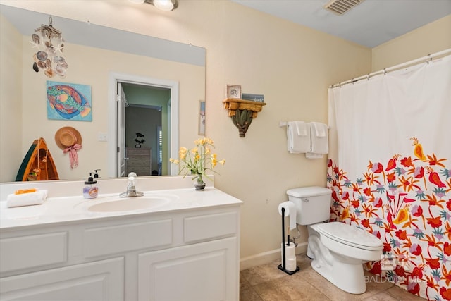 full bathroom with visible vents, toilet, vanity, tile patterned flooring, and baseboards