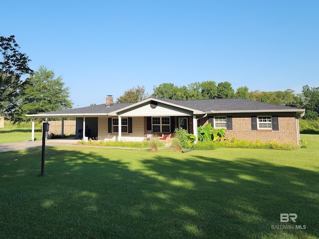 ranch-style house with a front lawn and a carport