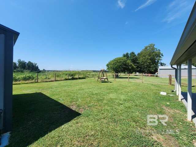 view of yard featuring a playground