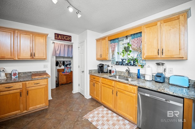 16596 Sugar Loop, Foley, AL 36535 - kitchen with a sink, a textured ceiling, dishwasher, and light stone countertops