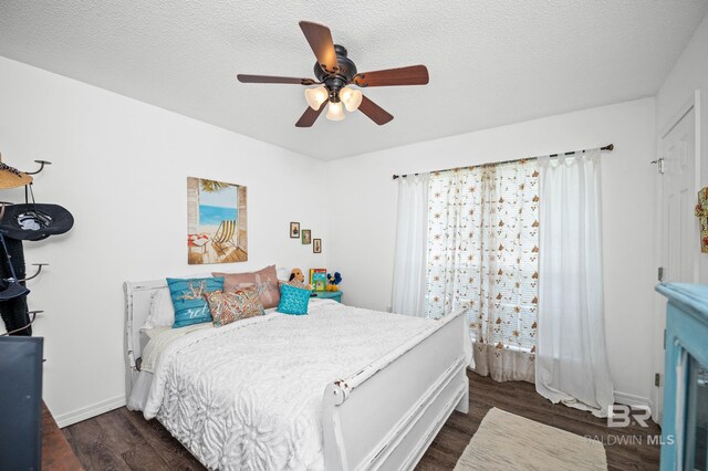 16596 Sugar Loop, Foley, AL 36535 - bedroom featuring a textured ceiling, wood finished floors, ceiling fan, and baseboards