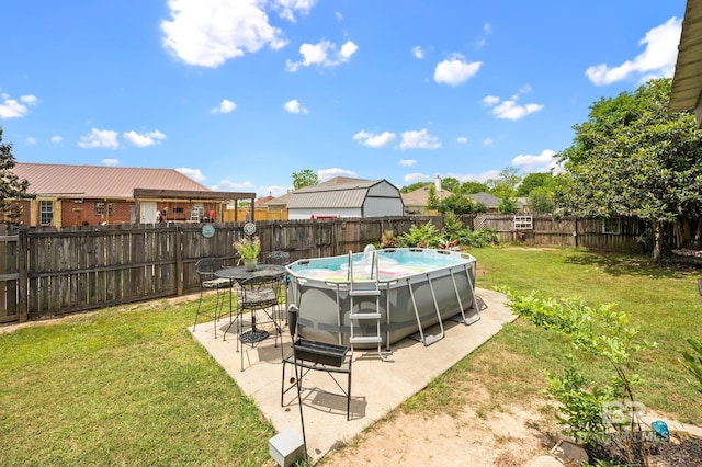 16596 Sugar Loop, Foley, AL 36535 - view of swimming pool with a residential view, a yard, a fenced backyard, and a patio area