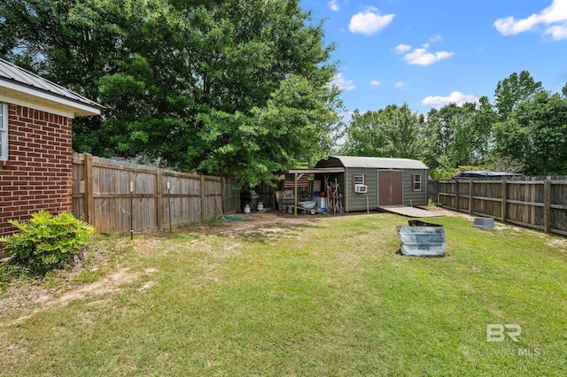 16596 Sugar Loop, Foley, AL 36535 - view of yard with an outdoor structure, a shed, and a fenced backyard