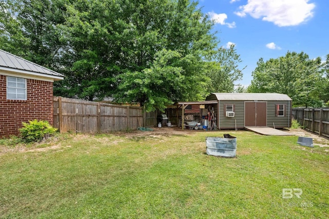 16596 Sugar Loop, Foley, AL 36535 - view of yard featuring cooling unit, an outbuilding, and a fenced backyard