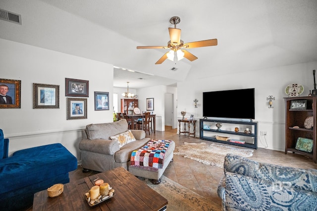 16596 Sugar Loop, Foley, AL 36535 - living area with lofted ceiling, visible vents, baseboards, and ceiling fan with notable chandelier
