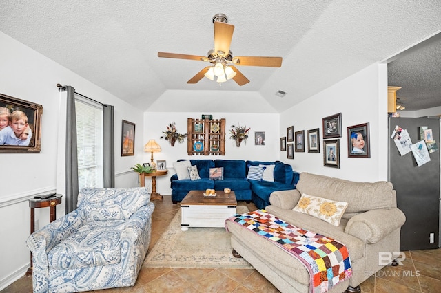 16596 Sugar Loop, Foley, AL 36535 - living room featuring visible vents, ceiling fan, a textured ceiling, and lofted ceiling