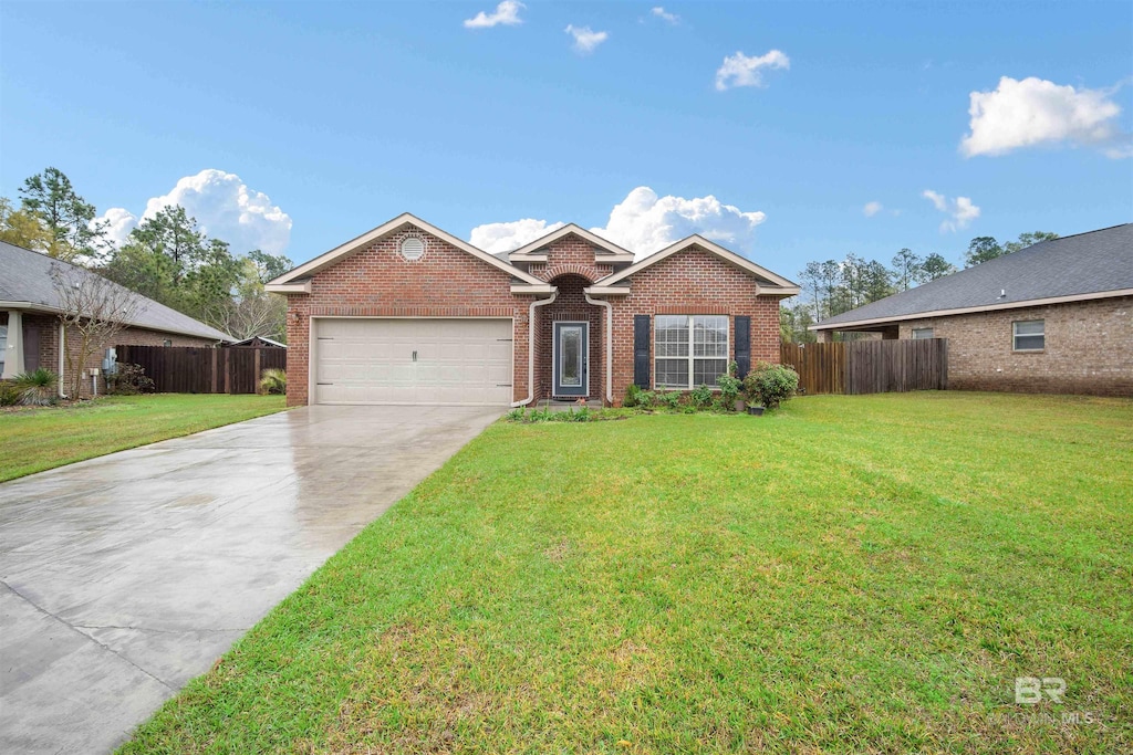 ranch-style house with driveway, fence, an attached garage, brick siding, and a front lawn