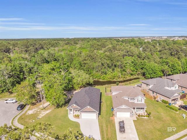 7056 Stone Chase Ln, Gulf Shores, AL 36542 - drone / aerial view featuring a wooded view