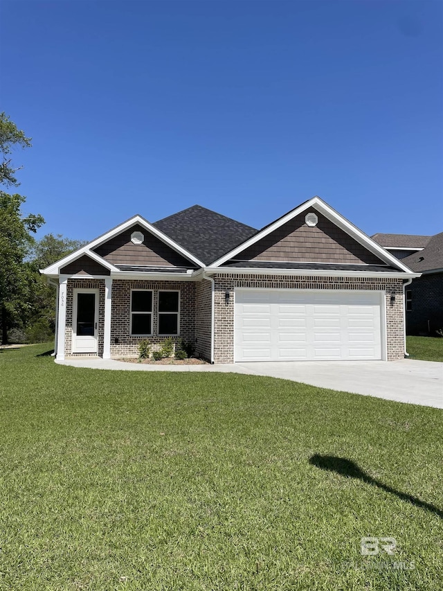 7056 Stone Chase Ln, Gulf Shores, AL 36542 - craftsman-style home with concrete driveway, brick siding, a front yard, and a garage