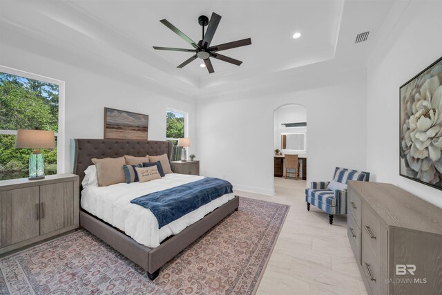 7056 Stone Chase Ln, Gulf Shores, AL 36542 - bedroom featuring recessed lighting, a raised ceiling, visible vents, arched walkways, and ceiling fan