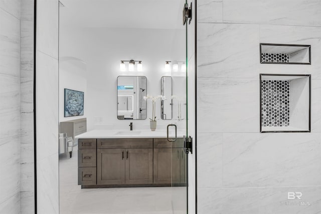 7056 Stone Chase Ln, Gulf Shores, AL 36542 - full bathroom with a shower stall, marble finish floor, and vanity