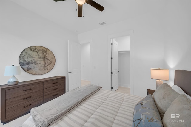 7056 Stone Chase Ln, Gulf Shores, AL 36542 - bedroom featuring visible vents, a spacious closet, and ceiling fan