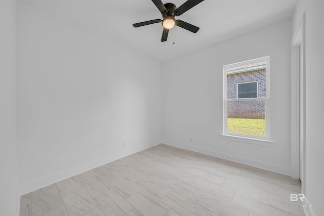 7056 Stone Chase Ln, Gulf Shores, AL 36542 - spare room with baseboards and ceiling fan