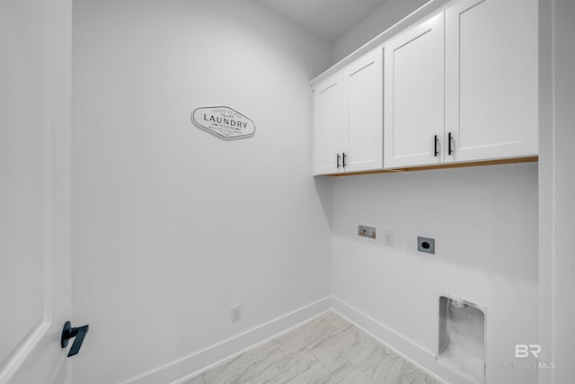 7056 Stone Chase Ln, Gulf Shores, AL 36542 - laundry area with marble finish floor, baseboards, electric dryer hookup, cabinet space, and washer hookup
