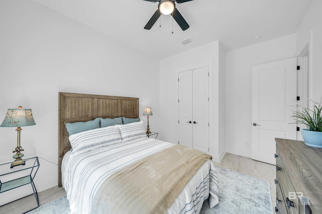7056 Stone Chase Ln, Gulf Shores, AL 36542 - bedroom with baseboards, visible vents, a closet, and ceiling fan