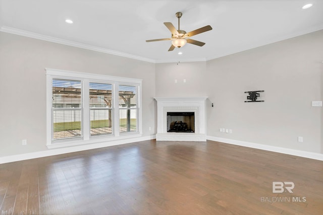 10606 Secretariat Blvd, Daphne, AL 36526 - unfurnished living room featuring baseboards, a ceiling fan, dark wood finished floors, and a fireplace