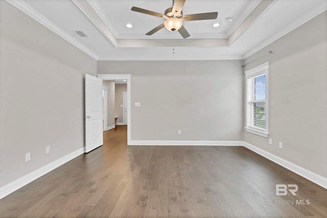 10606 Secretariat Blvd, Daphne, AL 36526 - unfurnished room with a raised ceiling, ceiling fan, visible vents, and dark wood-style floors