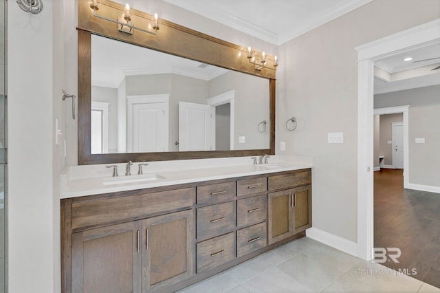 10606 Secretariat Blvd, Daphne, AL 36526 - bathroom featuring crown molding, baseboards, and a sink