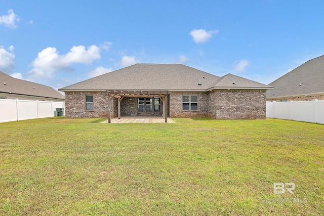 10606 Secretariat Blvd, Daphne, AL 36526 - rear view of property featuring a pergola, a yard, a patio area, and brick siding