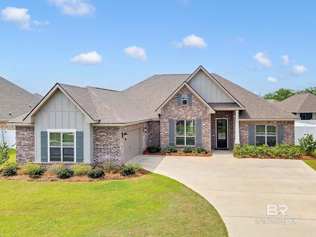 10606 Secretariat Blvd, Daphne, AL 36526 - craftsman house with concrete driveway, board and batten siding, an attached garage, brick siding, and a front lawn