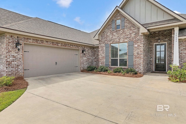 10606 Secretariat Blvd, Daphne, AL 36526 - craftsman house featuring brick siding, board and batten siding, and a shingled roof