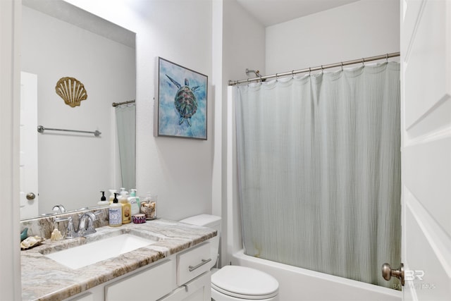 full bathroom featuring vanity, shower / bath combination with curtain, and toilet