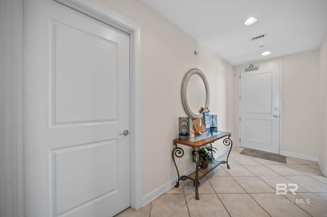 interior space featuring light tile patterned floors