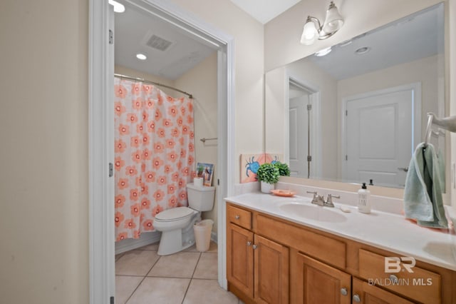 bathroom with curtained shower, tile patterned flooring, vanity, and toilet