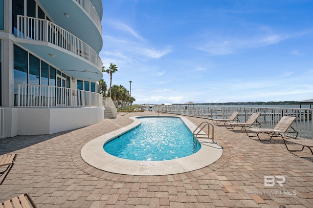 view of pool with a patio area