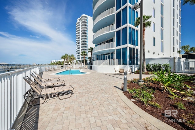 view of pool with a patio