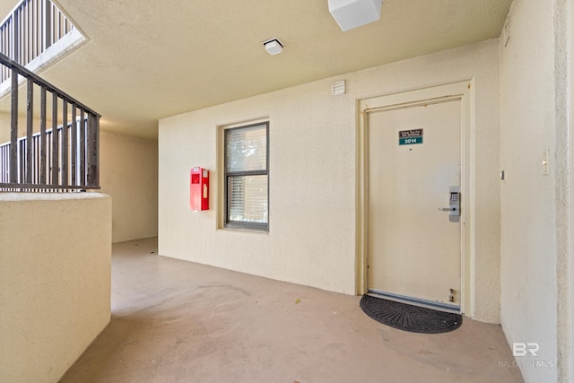 24230 Perdido Beach Blvd Unit 3014, Orange Beach, AL 36561 - view of exterior entry featuring stucco siding