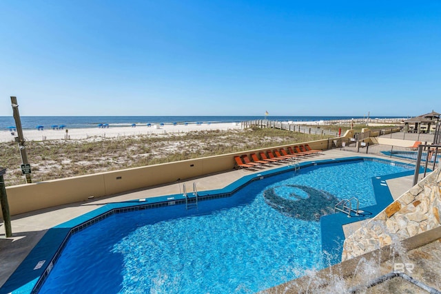 24230 Perdido Beach Blvd Unit 3014, Orange Beach, AL 36561 - community pool with view of water and beach and a patio