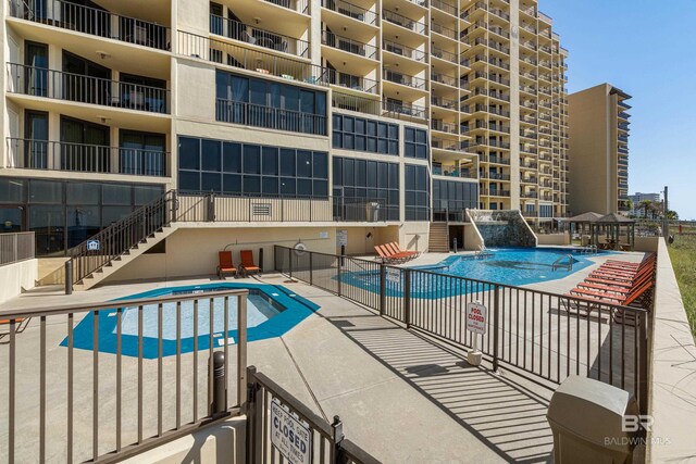 24230 Perdido Beach Blvd Unit 3014, Orange Beach, AL 36561 - community pool featuring a patio and stairs