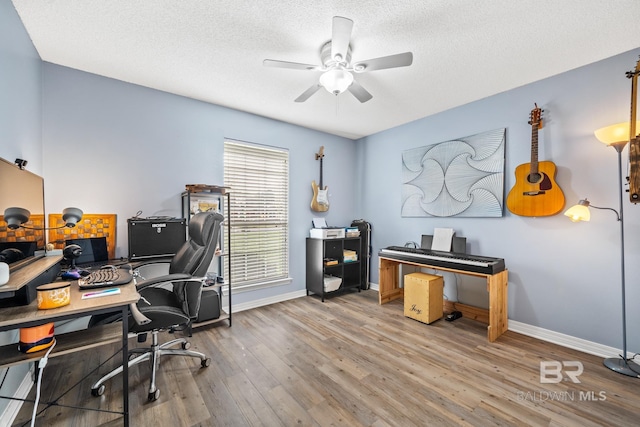 office space with wood-type flooring, a textured ceiling, and ceiling fan