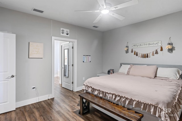 bedroom with dark wood-type flooring and ceiling fan