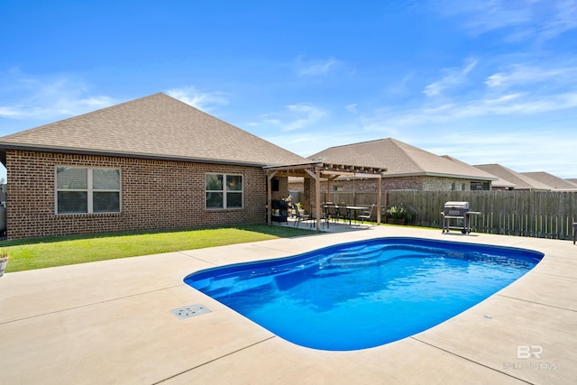 9439 Eiland Dr, Foley, AL 36535 - view of pool featuring a pergola, a patio, and grilling area