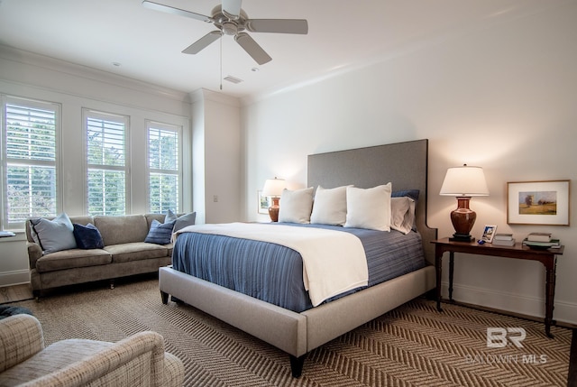 bedroom featuring ceiling fan, hardwood / wood-style flooring, and ornamental molding