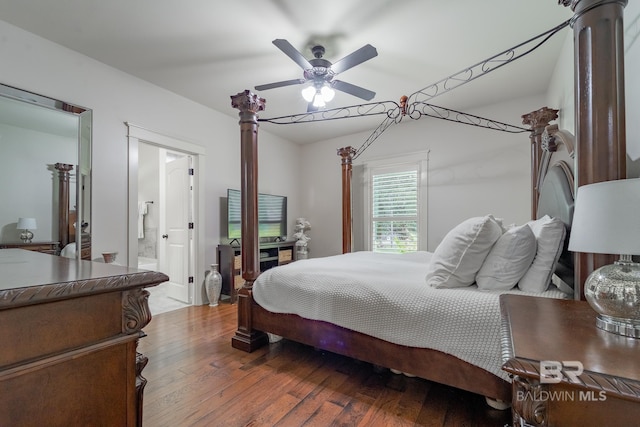 bedroom featuring a ceiling fan, wood-type flooring, and connected bathroom