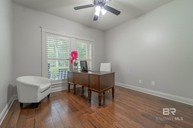 office area with a ceiling fan, baseboards, and wood-type flooring