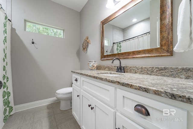 full bathroom with vanity, baseboards, tile patterned flooring, curtained shower, and toilet