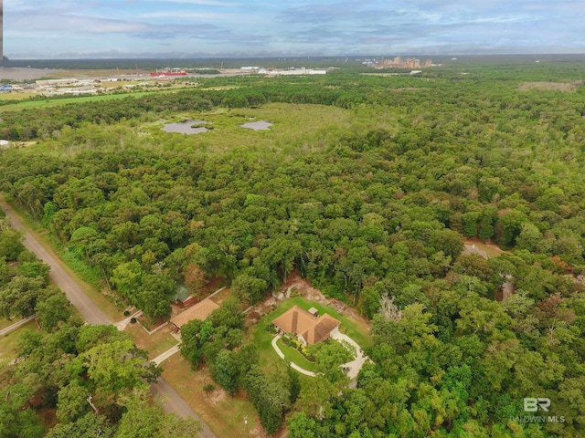 bird's eye view featuring a forest view