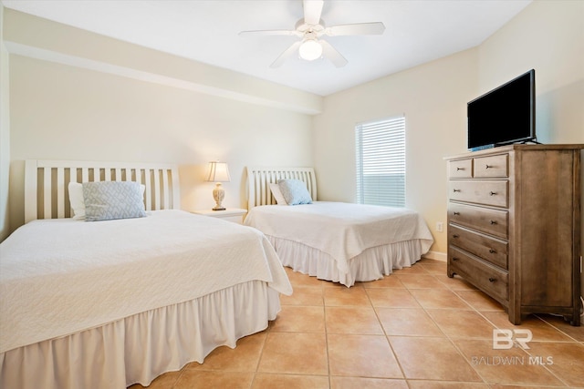 bedroom featuring ceiling fan and light tile patterned floors