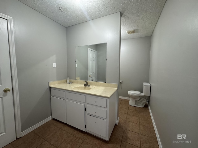 2316 Reneke Ave, Mobile, AL 36605 - bathroom with vanity, tile patterned floors, and a textured ceiling