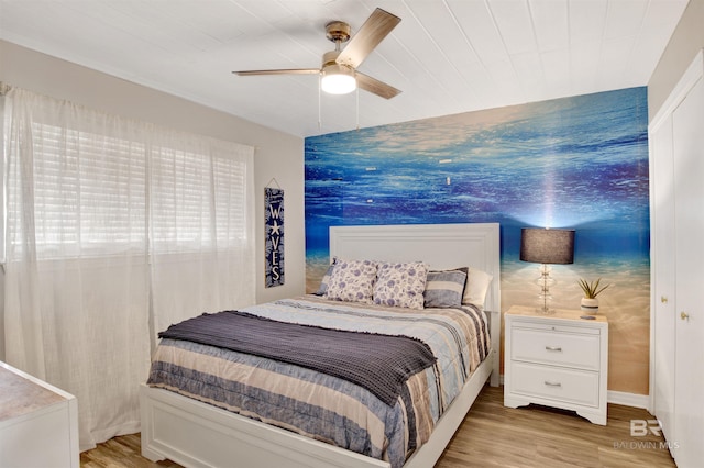 930 W Beach Blvd Unit 106, Gulf Shores, AL 36542 - bedroom with light wood-style flooring and ceiling fan