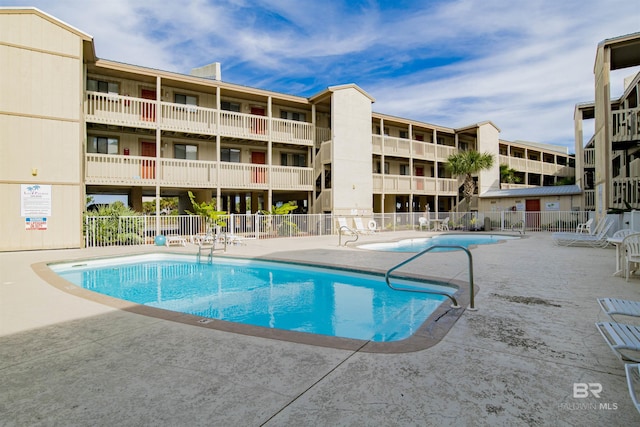 930 W Beach Blvd Unit 106, Gulf Shores, AL 36542 - community pool with fence and a patio
