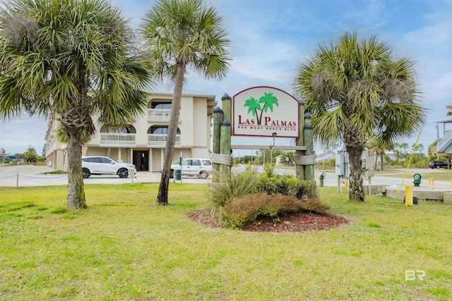 930 W Beach Blvd Unit 106, Gulf Shores, AL 36542 - community sign with a lawn