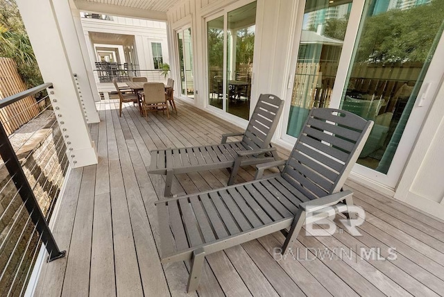 deck featuring outdoor dining space