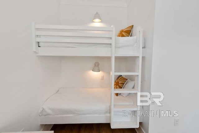 bedroom featuring wood finished floors