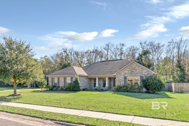 single story home featuring a front yard